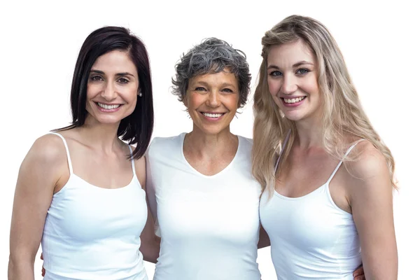 Women standing together with arms around — Stock Photo, Image