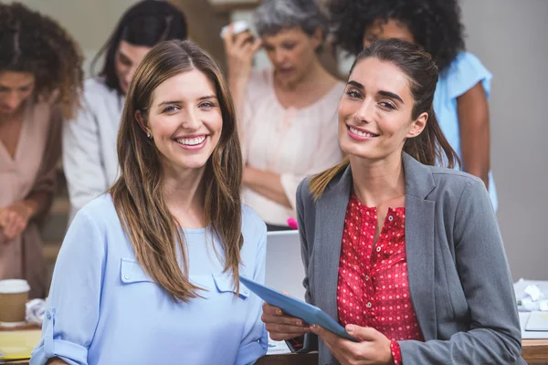 Two interior designers with digital tablet — Stock Photo, Image