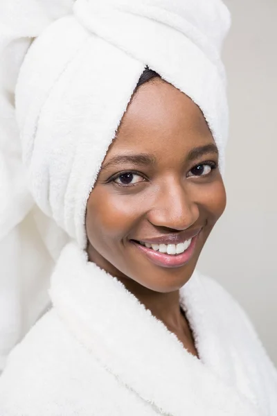 Young woman wearing white bathrobe — Stock Photo, Image