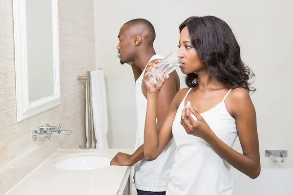 Beautiful woman having medicine — Stock Photo, Image