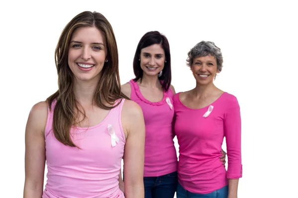 Smiling women in pink outfits posing — Stock Photo, Image