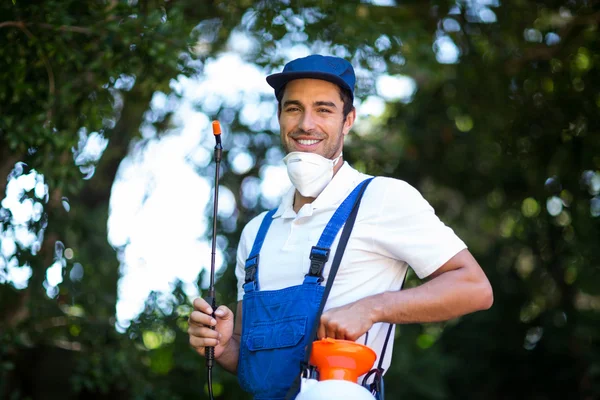 Happy insecticide worker — Stock Photo, Image