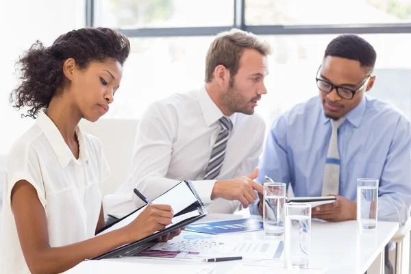 Business colleagues discussing report — Stock Photo, Image