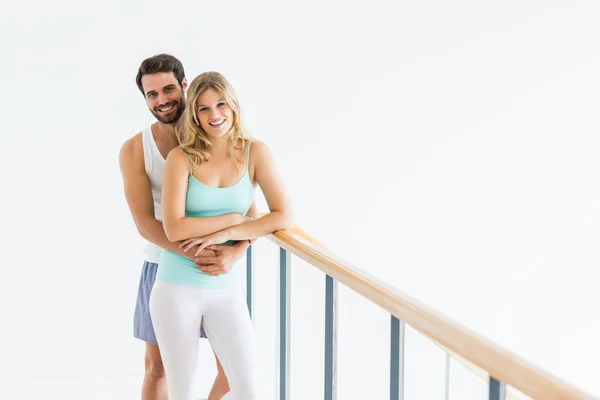 Couple standing near the railing — Stock Photo, Image