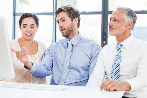 Colleagues discussing during meeting — Stock Photo, Image