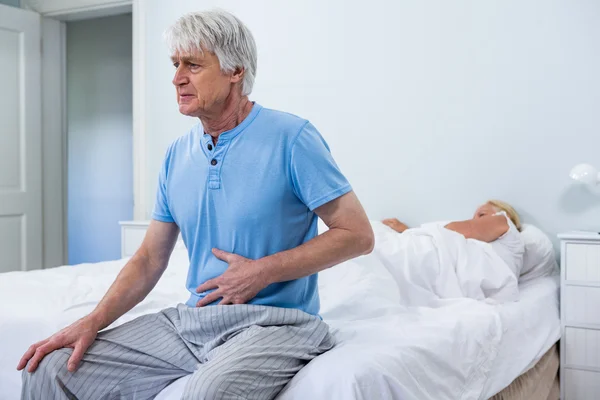 Senior man having stomach pain — Stock Photo, Image