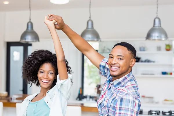 Couple dancing in kitchen — Stock Photo, Image