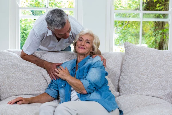 Senior woman touching husband hand — Stock Photo, Image