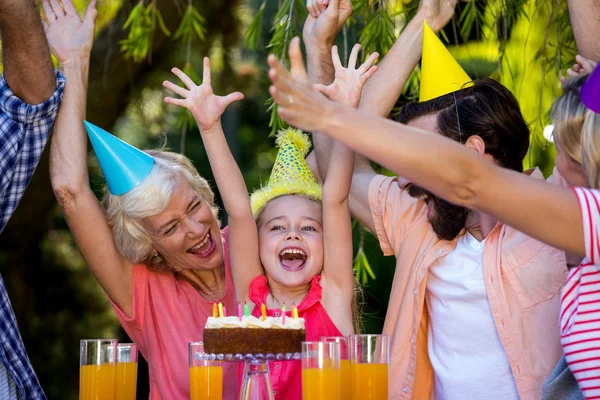 Family celebrating birthday at yard — Stock Photo, Image