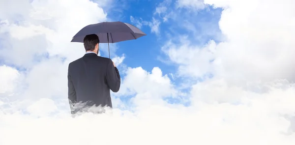 Podnikatelka v obleku drží deštník — Stock fotografie