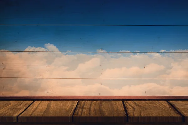 Composite image of wooden desk — Stock Photo, Image