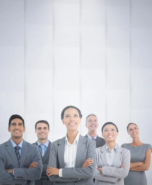 Business people looking up in office — Stock Photo, Image