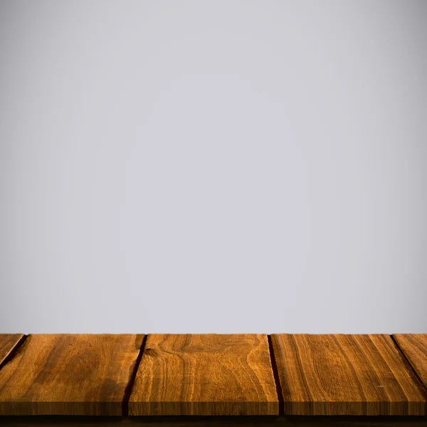 Composite image of wooden table — Stock Photo, Image