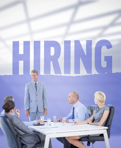 Composite image of business people listening during meeting — Stock Photo, Image