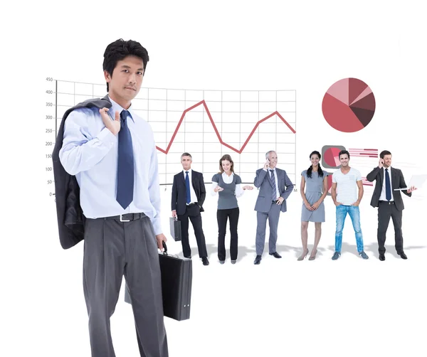 Businessman holding briefcase and jacket on shoulder Stock Photo