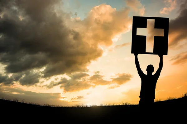 Composite image of cheering male silhouette — Stock Photo, Image