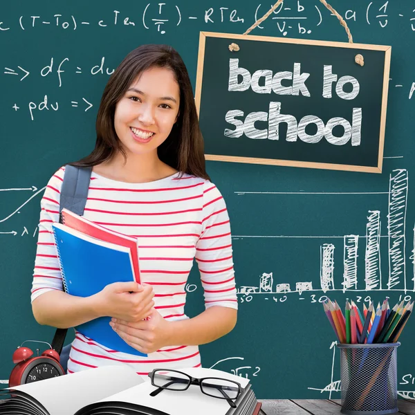 College girl holding books — Stock Photo, Image