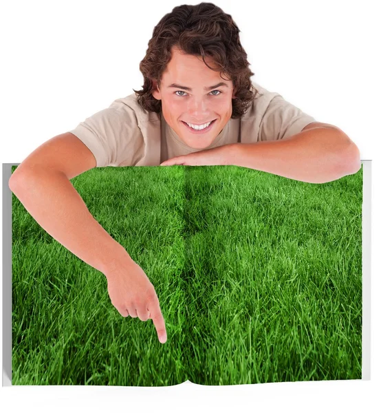 Person pointing on lawn — Stock Photo, Image