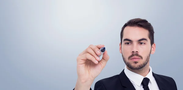 Geschäftsmann schreibt mit Filzstift — Stockfoto