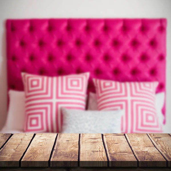 Bed with colorful pillows — Stock Photo, Image