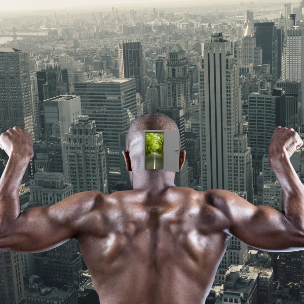 Muskulös atlet poserar — Stockfoto