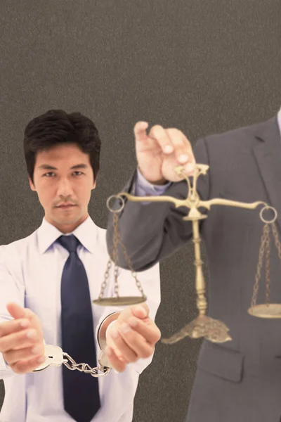 Male lawyer holding scale — Stock Photo, Image