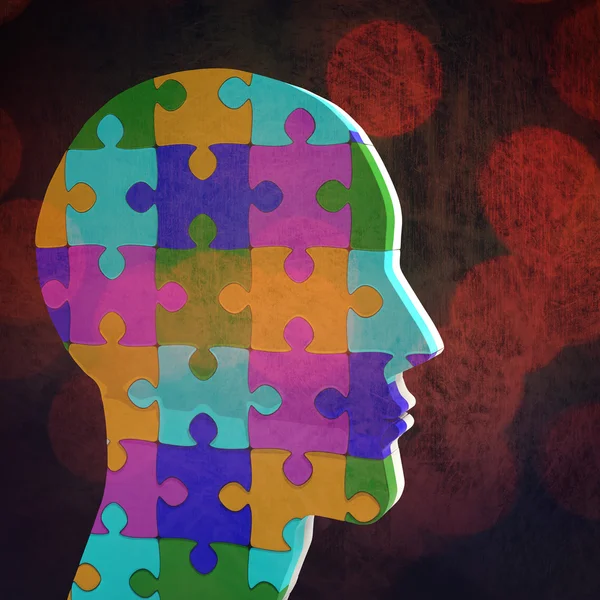 Head made of jigsaw pieces — Stock Photo, Image