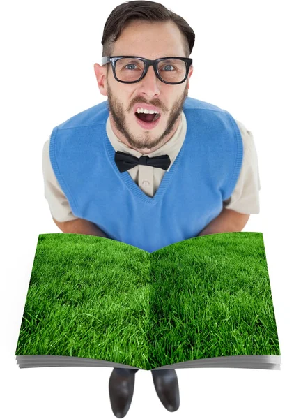 Man holding lawn book — Stock Photo, Image