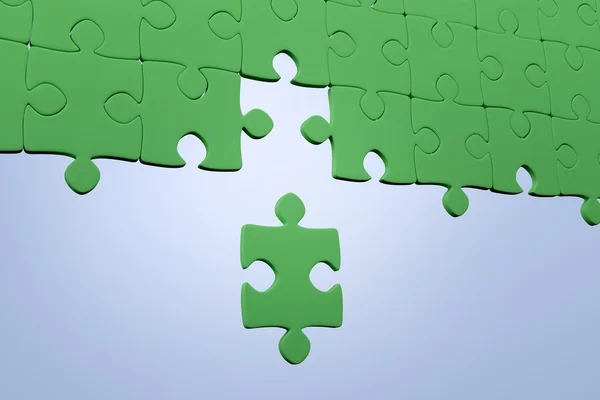 녹색 직소 퍼즐 — 스톡 사진