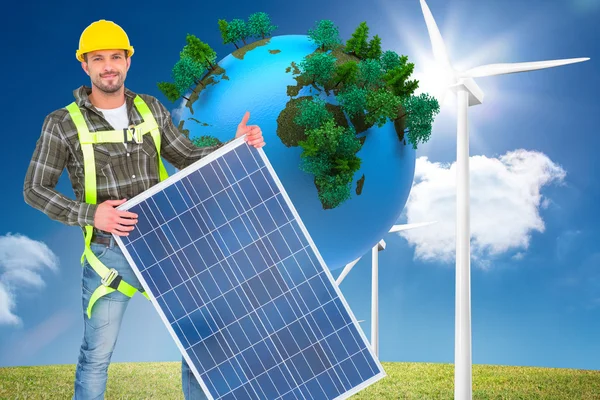 Handyman with solar panel — Stock Photo, Image