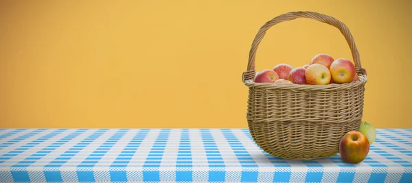 Composite image of basket of apples — Stock Photo, Image