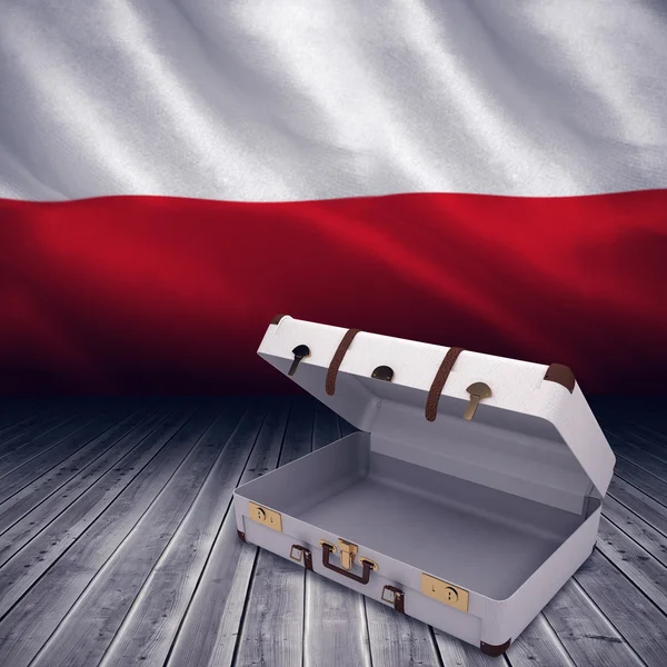 Otworzyć walizkę i Polski flaga falujący — Zdjęcie stockowe