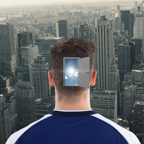 Sportsman head against view of cityscape — Stock Photo, Image