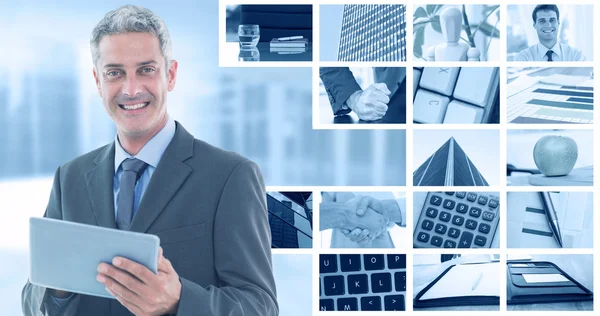 Happy businessman using tablet pc — Stock Photo, Image