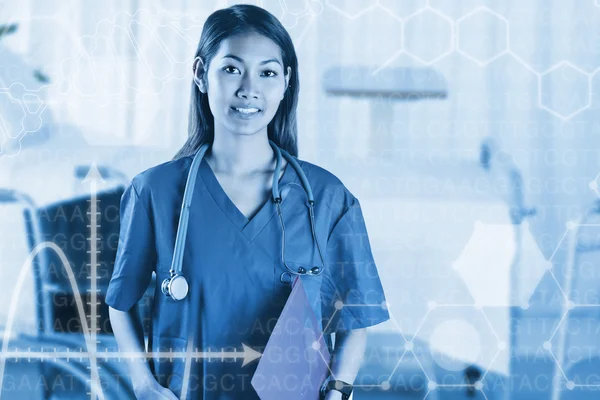 Asian nurse with stethoscope looking at camera — Stock Photo, Image