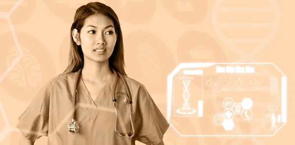 Asiatische Krankenschwester mit Stethoskop Blick auf Kamera — Stockfoto