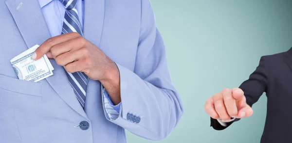 Businessman keeping banknote in pocket — Stock Photo, Image