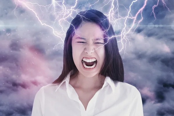 Screaming woman against cloudy sky — Stock Photo, Image