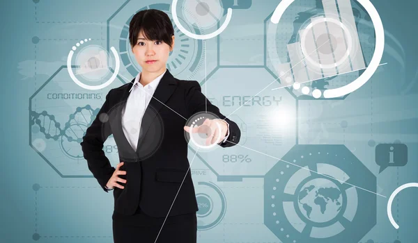 Focused businesswoman pointing — Stock Photo, Image