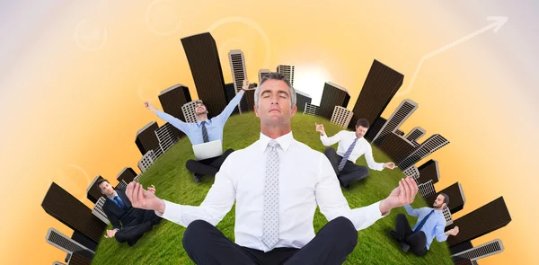 Biznesmenów medytacji w pozach Lotos — Zdjęcie stockowe