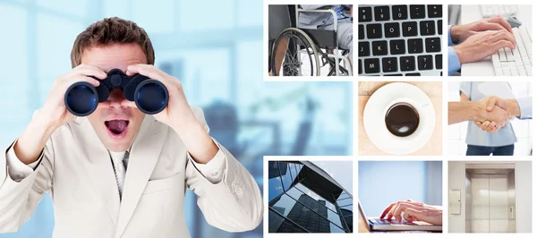 Positive businessman using binoculars — Stock Photo, Image