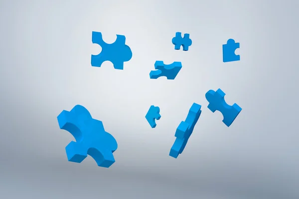 Blauwe puzzel stukjes — Stockfoto