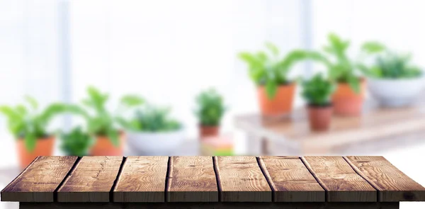 Piano verde sul tavolo con libro — Foto Stock