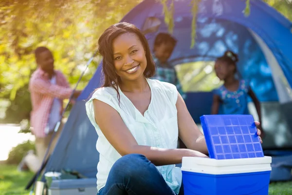 Happy woman posing and using a cooler — Stock Photo, Image
