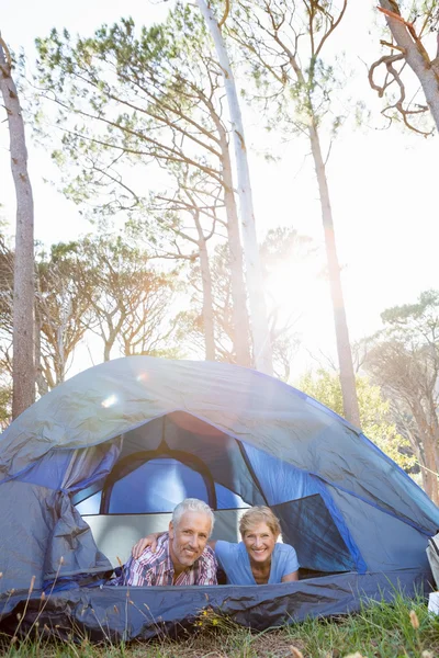 Senior couple elongating inside their tent — Stock Photo, Image