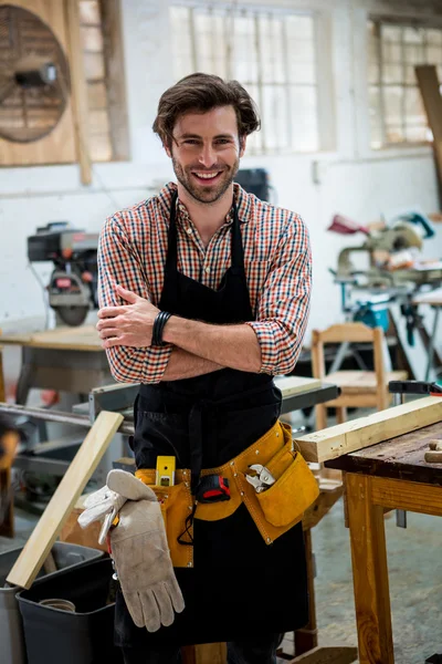 Carpenter is posing with his craft — Stock Photo, Image