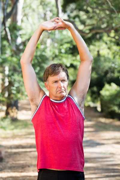 Man stretching his arms — Stock Photo, Image