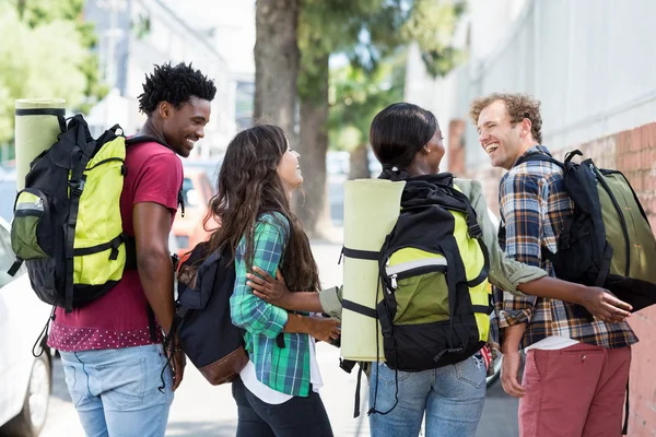 Friends standing with rucksack — Stock Photo, Image