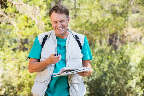 Senior man looking his swatch — Stock Photo, Image