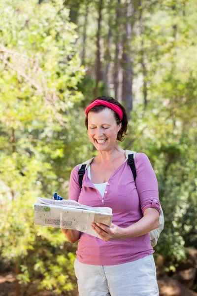 Senior woman is reading — Stock Photo, Image